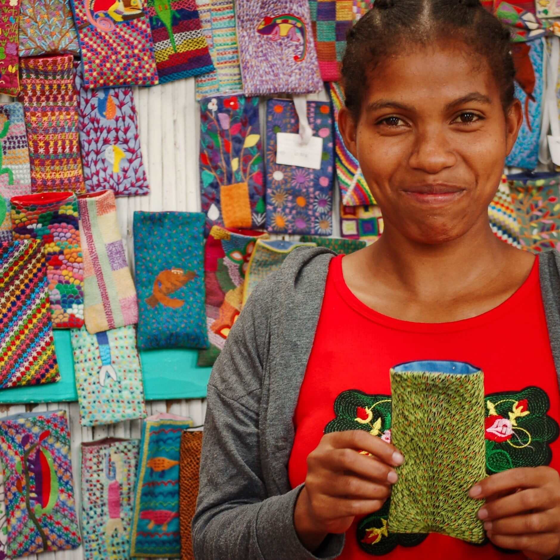 Rosine shows a finished handmade glasses case