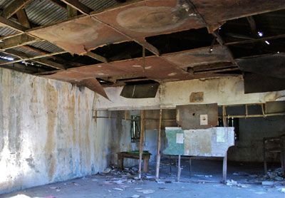 A school building room that is old and falling apart