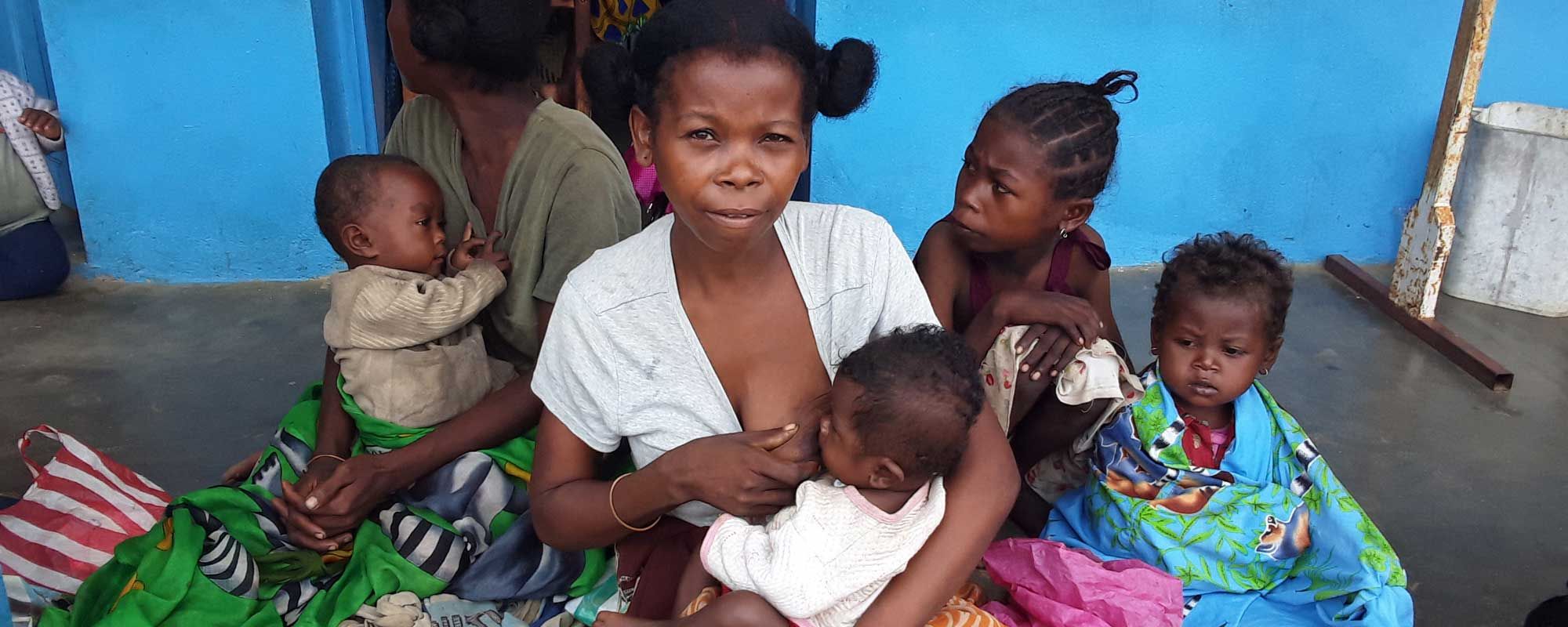 A mother breastfeeding at a rural health clinic in southeast Madagascar