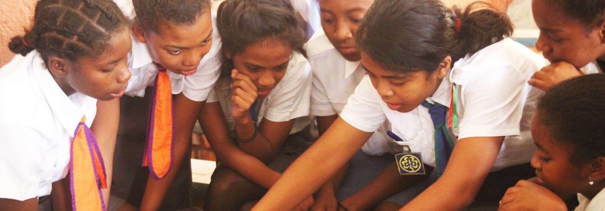 Girls working together to learn Menstrual Hygiene education