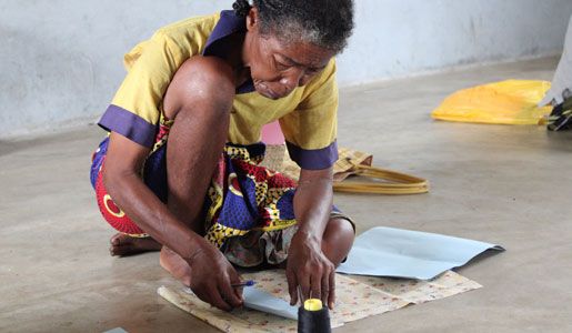 A woman creating the pad template