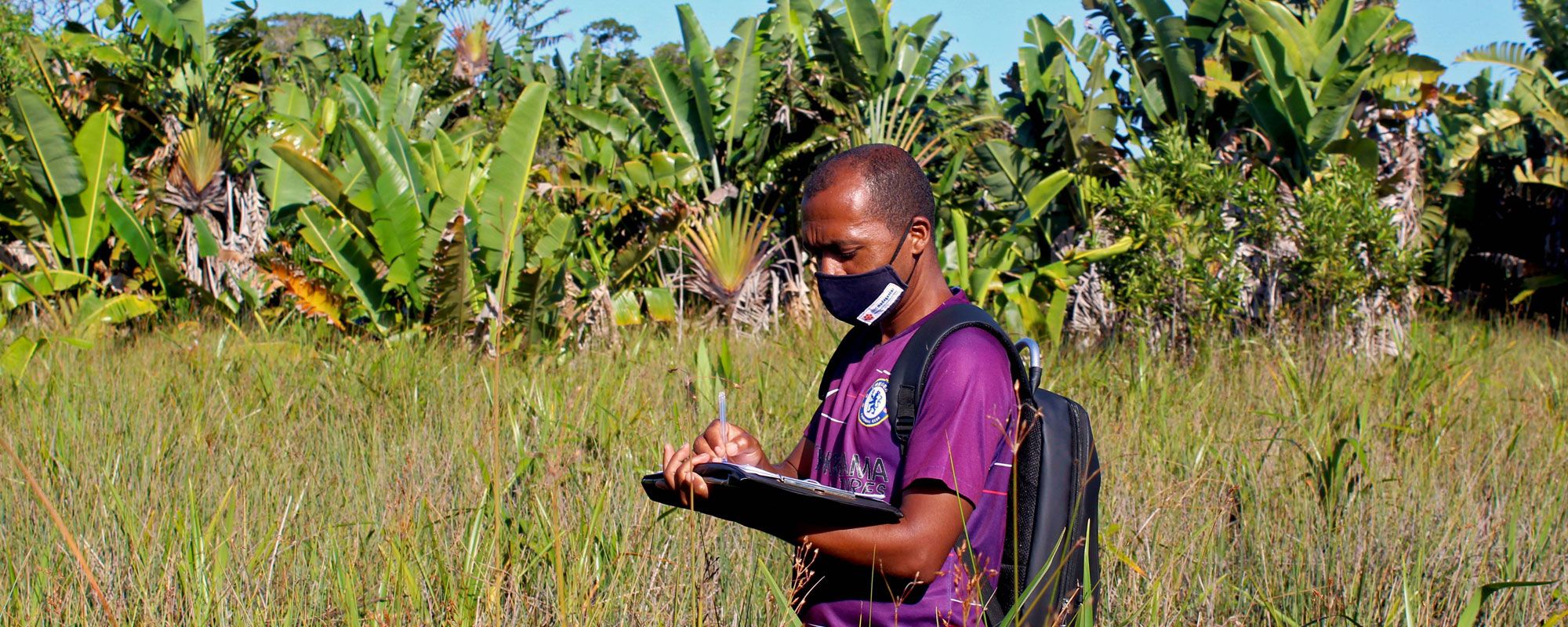 Hoby carrying out Mahampy wetland research whilst wearing a face mask