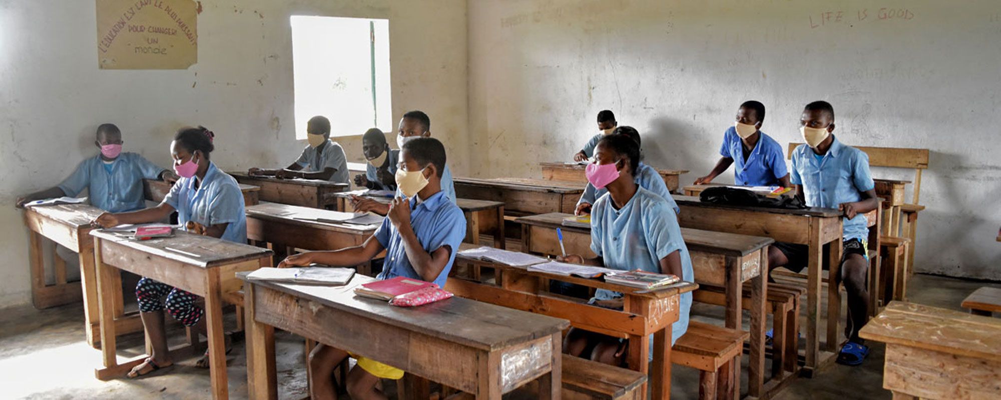 Students in Mahatalaky middle school, Madagascar, wearing masks distributed by SEED