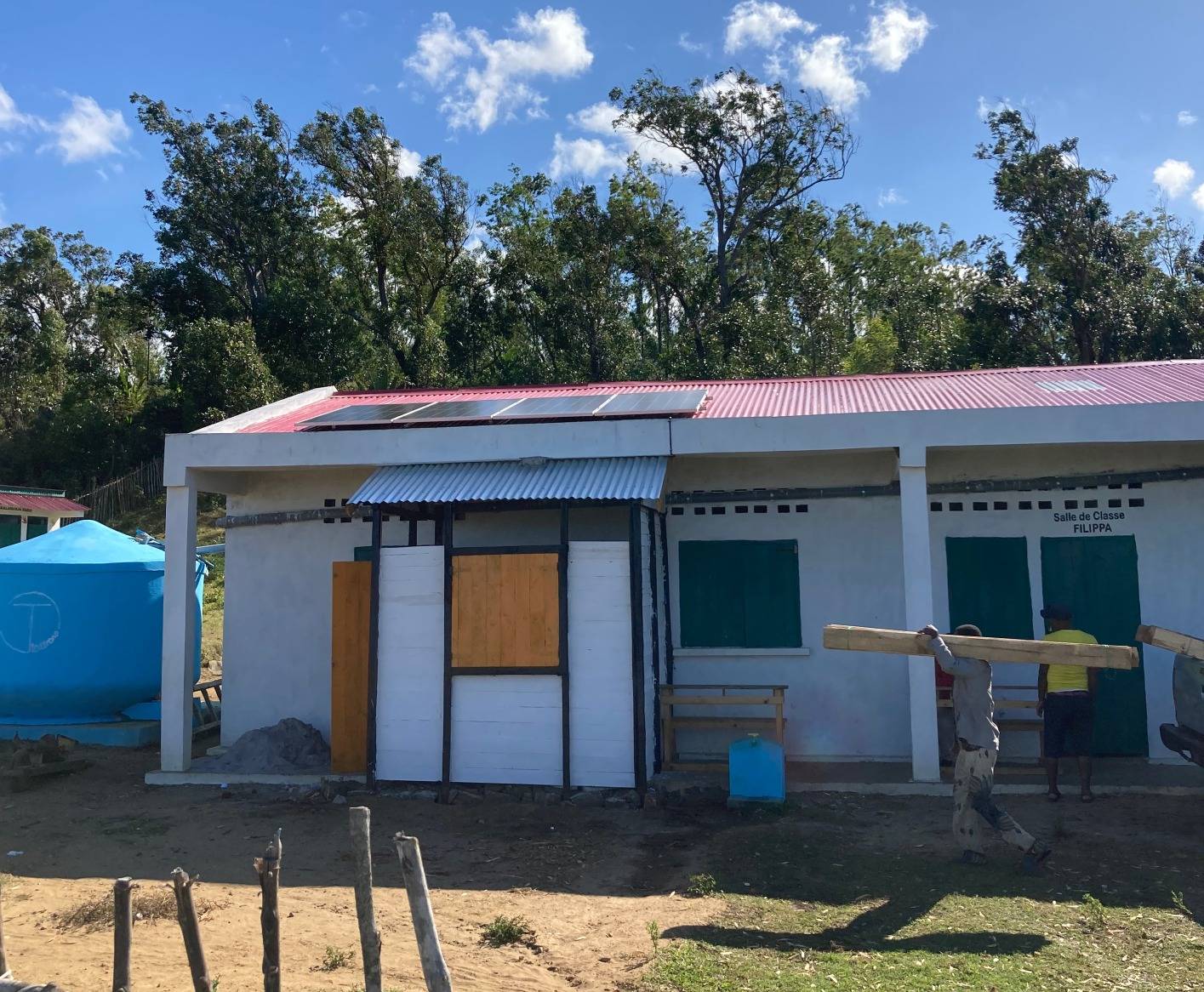 A solar panel installed on the roof of a school