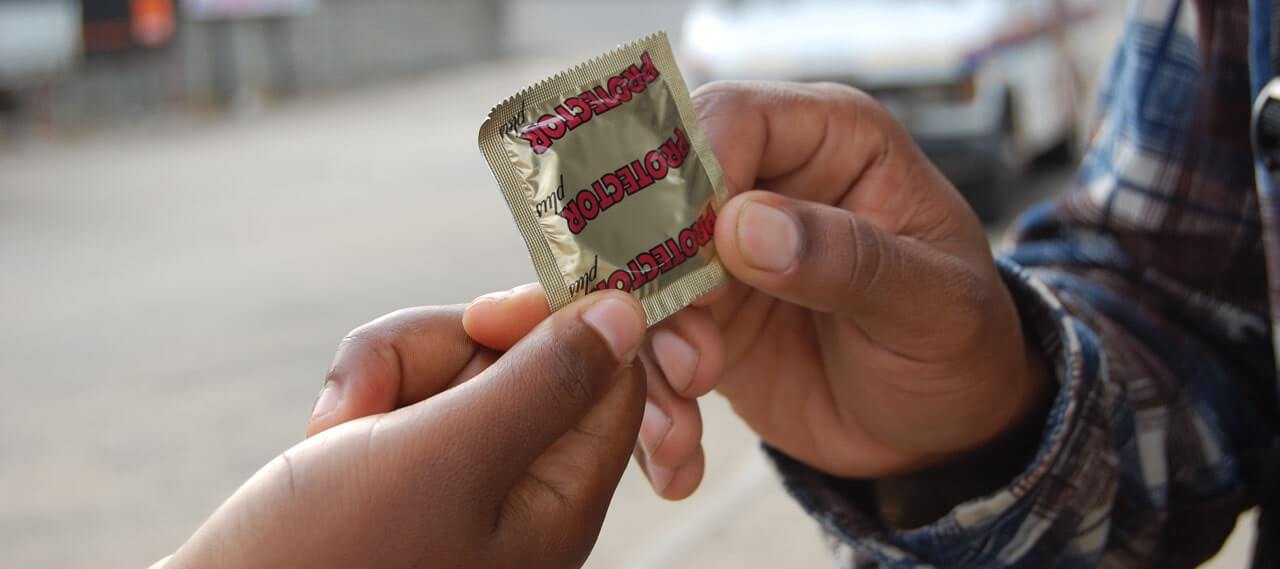 A condom is shown during a sexual education session