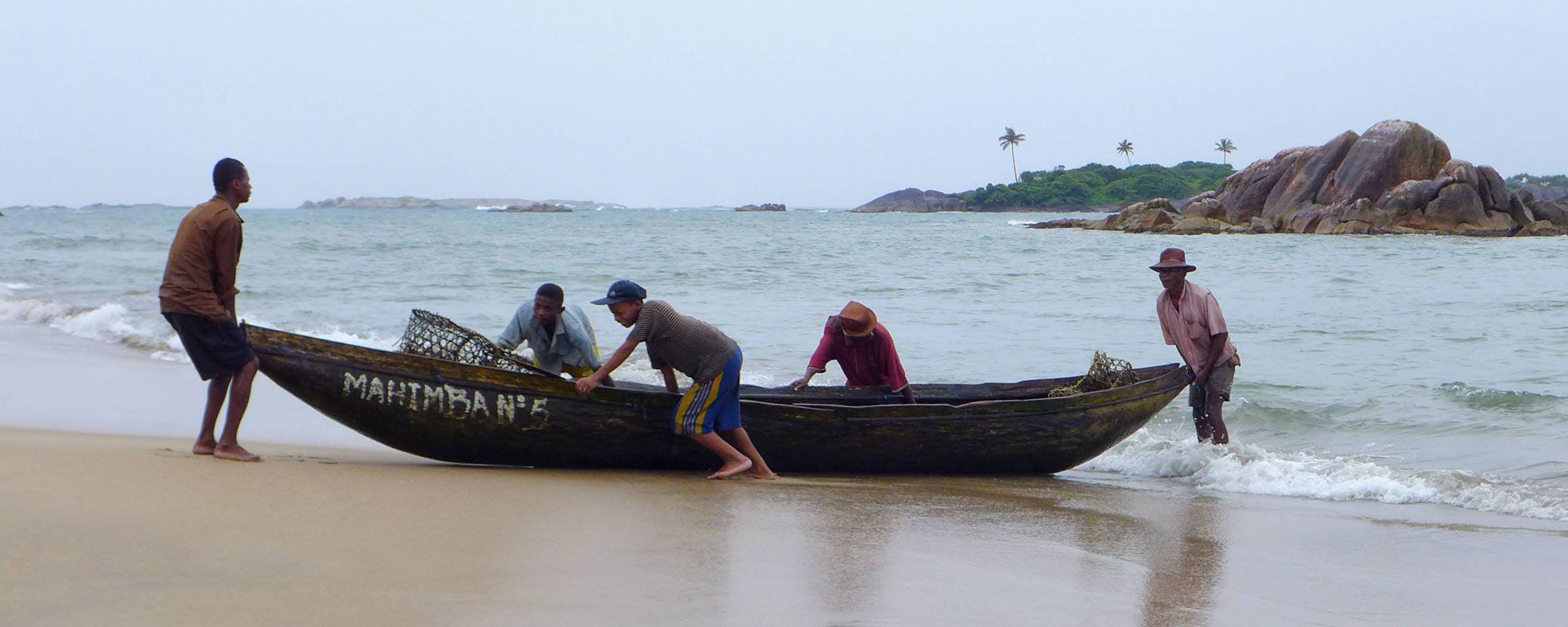 Landing a traditional boat at the lobster fishery in Sainte Luce