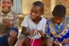 mahampy-children-weaving-bracelets-sainte-luce-outreach-youth.jpg